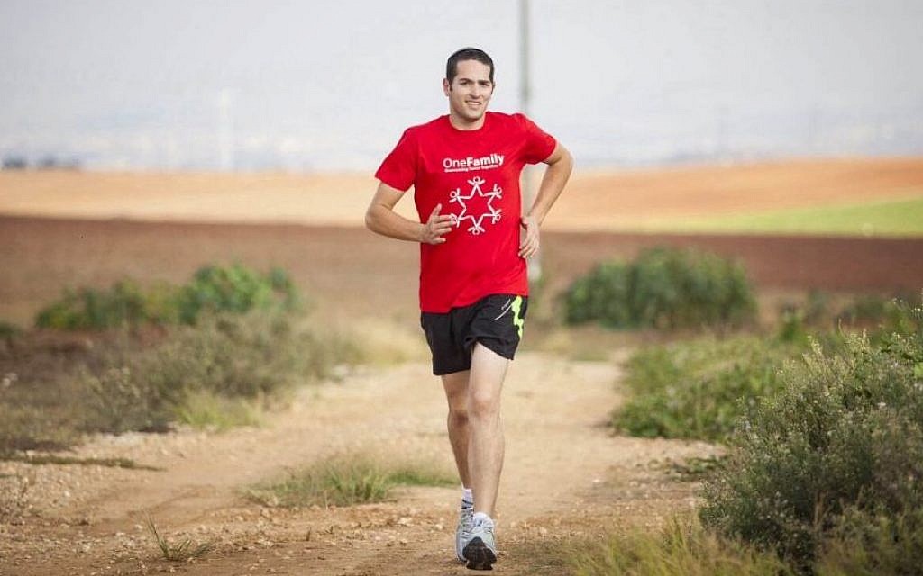 After being pulled from the rubble in Gaza, it wasn't clear if Aharon Karov would live, let alone run in the NY marathon. (photo credit: courtesy) After being pulled from the rubble in Gaza, it wasn't clear if Aharon Karov would live, let alone run in the NY marathon. (photo credit: courtesy)