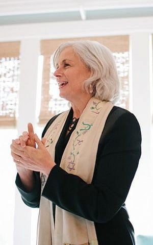 Rabbi Zecher gives instructions before a wedding ceremony (photo credit: courtesy)