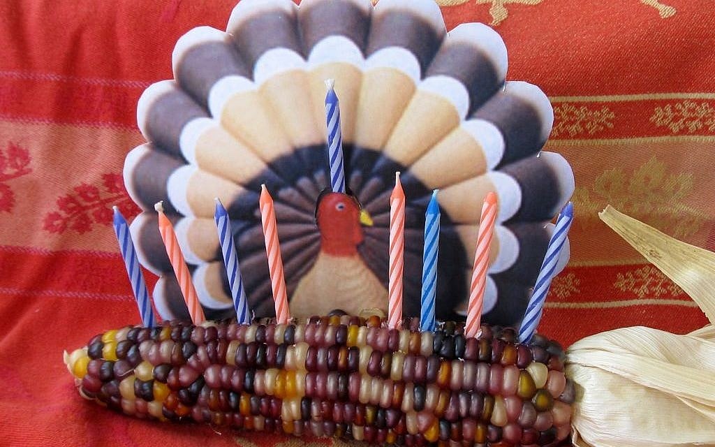 With the cornukiyah,a centerpiece suitable for a Thanksgivukkah table. (photo credit: Edmon J. Rodman/JTA) With the cornukiyah,a centerpiece suitable for a Thanksgivukkah table. (photo credit: Edmon J. Rodman/JTA)