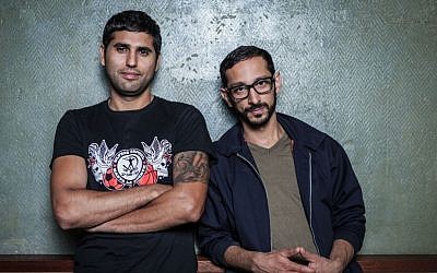 Roy Siny, left, and Reza Khani are the founders of the Iranian-Israeli party collective No Beef. (photo credit: Boaz Arad/JTA)