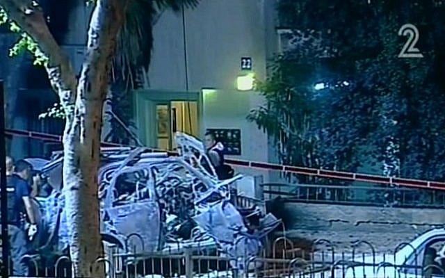 Screen capture from Channel 2 showing the aftermath of a car explosion in Tel Aviv on November 7, 2013. The target of the attack was a top state prosecutor. Screen capture from Channel 2 showing the aftermath of a car explosion in Tel Aviv on November 7, 2013. The target of the attack was a top state prosecutor.