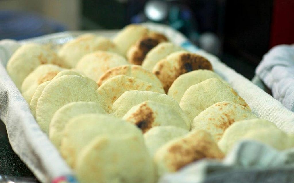 Freshly baked pita bread. (photo credit: Courtesy of Vered Maoz) Freshly baked pita bread. (photo credit: Courtesy of Vered Maoz)