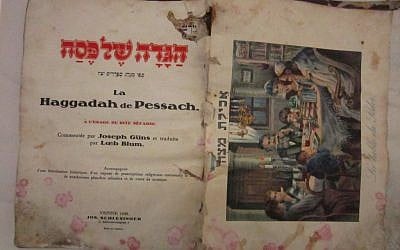 A 1930 Viennese haggadah recovered from Baghdad BEFORE preservation. (photo credit: The National Archives)