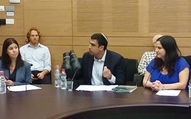 MK Yoni Chetboun making a point with his old boots (Photo credit: Courtesy Yoni Chetboun)