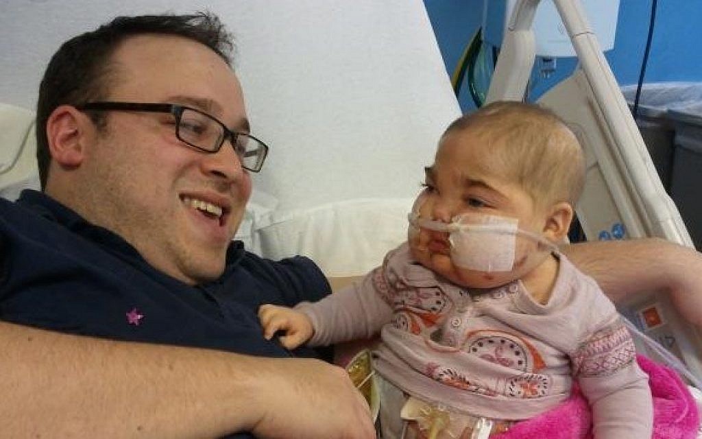 Seth Galena with his daughter Ayelet in the hospital. (Courtesy of Seth Galena)