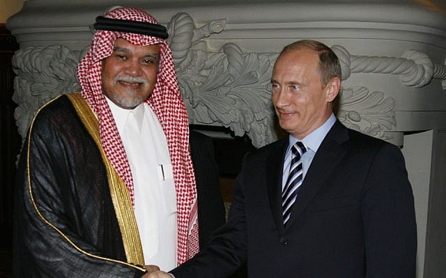 Russia's then-prime minister Vladimir Putin, right, greets the head of Saudi Arabia's National Security Council, Prince Bandar bin Sultan, in Moscow, July 14, 2008 (photo credit: AP/RIA-Novosti)