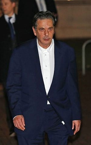 Art dealer Charles Saatchi leaves Isleworth Crown Court in London, Friday, Nov. 29, 2013. (photo credit: AP Photo/Matt Dunham) Art dealer Charles Saatchi leaves Isleworth Crown Court in London, Friday, Nov. 29, 2013. (photo credit: AP Photo/Matt Dunham)