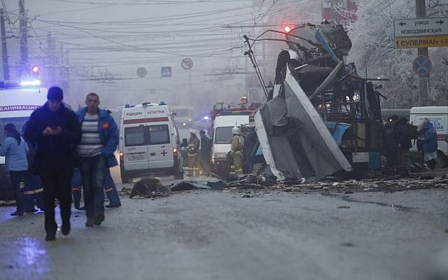 Ambulances line up at the site of a trolleybus explosion, background, in Volgograd, Russia, Monday, December 30, 2013. (AP Photo/Denis Tyrin) Ambulances line up at the site of a trolleybus explosion, background, in Volgograd, Russia, Monday, December 30, 2013. (AP Photo/Denis Tyrin)