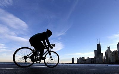 Mayor Rahm Emanuel has made bike lanes and bike programs a signature issue, believing it makes downtown an attractive place for bright young people and innovative companies. (photo credit: AP Photo/Charles Rex Arbogast)