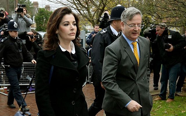 Celebrity chef, Nigella Lawson, left, arrives at Isleworth Crown Court in London, on Wednesday (photo credit: AP/PA/Andrew Matthews) Celebrity chef, Nigella Lawson, left, arrives at Isleworth Crown Court in London, on Wednesday (photo credit: AP/PA/Andrew Matthews)