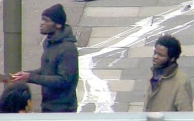 This photo made from CCTV and issued by the Metropolitan Police on Thursday December 19, 2013 shows Michael Adebolajo and Michael Adebowale on May 22, 2013 speaking to a member of the public near the Woolwich Barracks in London. (photo credit: AP/Metropolitan Police)