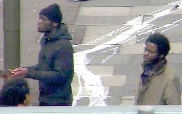 This photo made from CCTV and issued by the Metropolitan Police on Thursday December 19, 2013 shows Michael Adebolajo and Michael Adebowale on May 22, 2013 speaking to a member of the public near the Woolwich Barracks in London. (photo credit: AP/Metropolitan Police) This photo made from CCTV and issued by the Metropolitan Police on Thursday December 19, 2013 shows Michael Adebolajo and Michael Adebowale on May 22, 2013 speaking to a member of the public near the Woolwich Barracks in London. (photo credit: AP/Metropolitan Police)