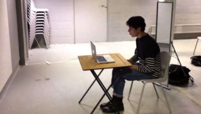 Clayton Pettet in a classroom (photo credit: YouTube screenshot)
