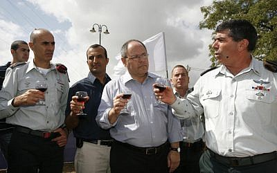 Shamni, left, with former head of the Council of Settlements, Dani Dayan, and then-Chief of the General Staff Gabi Ashkenazi (Miriam Alster/ Flash 90) Shamni, left, with former head of the Council of Settlements, Dani Dayan, and then-Chief of the General Staff Gabi Ashkenazi (Miriam Alster/ Flash 90)