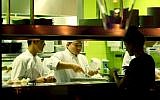 Chinese foreign workers cook in a Tel Aviv restaurant, 2008. (photo credit: Moshe Shai/Flash90)