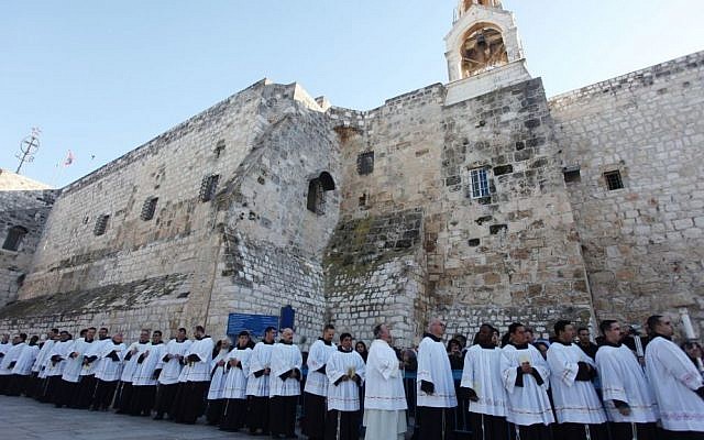 Illustrative photo of clergymen gathering at Manger Square outside the Church of Nativity for Christmas celebrations in the West Bank city of Bethlehem, December 24, 2012 (photo credit: Issam Rimawi/Flash90) Illustrative photo of clergymen gathering at Manger Square outside the Church of Nativity for Christmas celebrations in the West Bank city of Bethlehem, December 24, 2012 (photo credit: Issam Rimawi/Flash90)