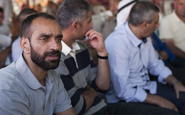Palestinian prisoner Samer Issawi arrives to his home in Issawiya after he was released in the first phase of the prisoner exchange deal which took place between Hamas and the Israeli government. October 18, 2011. (Photo credit: Yonatan Sindel/Flash90) Palestinian prisoner Samer Issawi arrives to his home in Issawiya after he was released in the first phase of the prisoner exchange deal which took place between Hamas and the Israeli government. October 18, 2011. (Photo credit: Yonatan Sindel/Flash90)