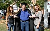 Sefi Rivlin (center) joking around with some students at the College of Management in Rishon Lezion on October 27, 2013. The iconic comedian died on Tuesday at the age of 66 (photo credit:  Markowicz/Flash90)