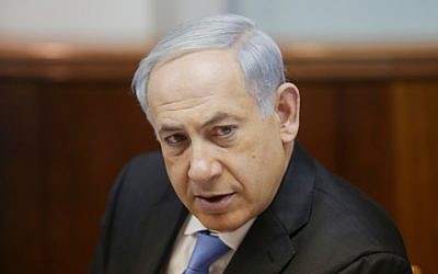 Prime Minister Benjamin Netanyahu leads the weekly cabinet meeting, in Jerusalem on December 08, 2013. (photo credit: Alex Kolomoisky/POOL/FLASH90)