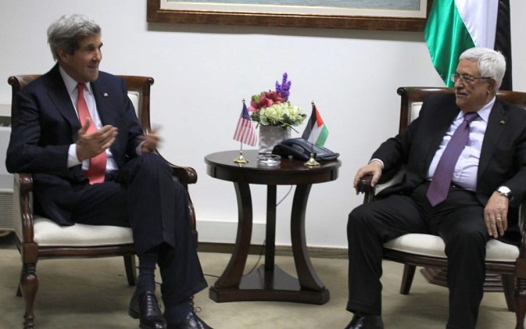 US Secretary of State John Kerry, left, meets with Palestinian Authority President Mahmoud Abbas at the presidential compound in Ramallah on December 12, 2013. (photo credit: Issam Rimawi/Flash90) US Secretary of State John Kerry, left, meets with Palestinian Authority President Mahmoud Abbas at the presidential compound in Ramallah on December 12, 2013. (photo credit: Issam Rimawi/Flash90)