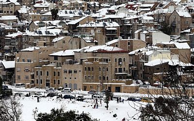 The snow-covered rooftops of Jerusalem's Nachlaot neighborhood (photo credit: Nati Shohat/Flash90)