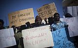 Sudanese refugees demonstrate in front of the Knesset in protest of the new "Holot" detention camp for illegal migrants, on Monday, December 17, 2013. (photo credit: Yonatan Sindel/Flash90)