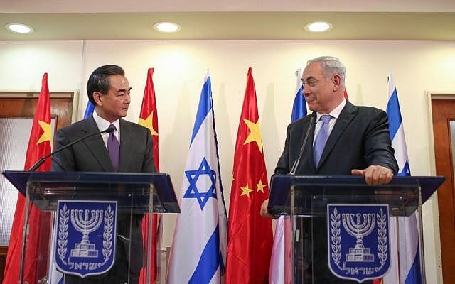 Israeli Prime Minister Benjamin Netanyahu (R) and Chinese Foreign Minister Wang Yi seen at a joint press conference at Prime Minister Netanyahu's office in Jerusalem. December 18, 2013. (Photo credit: Noam Moskowitz/POOL/Flash90 Israeli Prime Minister Benjamin Netanyahu (R) and Chinese Foreign Minister Wang Yi seen at a joint press conference at Prime Minister Netanyahu's office in Jerusalem. December 18, 2013. (Photo credit: Noam Moskowitz/POOL/Flash90