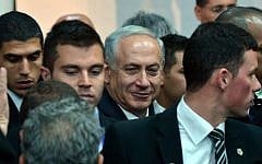 Prime Minister Benjamin Netanyahu arrives at a Likud party conference in Tel Aviv in December 2013 (photo credit: Yossi Zeliger/Flash90)