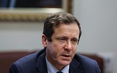 Labor Party leader Isaac Herzog speaks during a faction meeting in the Knesset on December 23, 2013. (photo credit: Yonatan Sindel/Flash90)