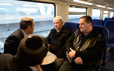 Prime Minister Benjamin Netanyahu (center) with Transportation Minister Yisrael Katz (right) inaugurating Sderot's train station in December 2013. (photo credit: Kobi Gideon /GPO/FLASH90) Prime Minister Benjamin Netanyahu (center) with Transportation Minister Yisrael Katz (right) inaugurating Sderot's train station in December 2013. (photo credit: Kobi Gideon /GPO/FLASH90)