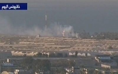 Smoke billows after an IDF strike in the Gaza Strip, December 2013. (photo credit: screen capture/ Channel 2)