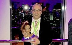 Amos Porat shows off a Scentasia-equipped toy. (photo credit: Courtesy)