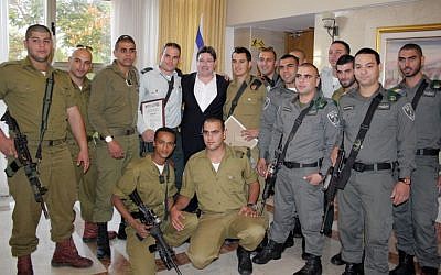 Christian Arab Border Policemen and soldiers flank deputy minister MK Ofir Akunis (Photo credit: courtesy: IDF Spokesperson's Unit)