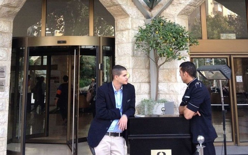 Inbal architect Michael Schwartz worked with the stone arches, designing glass panels that created a more dramatic entrance to the hotel (photo credit: Jessica Steinberg/Times of Israel) Inbal architect Michael Schwartz worked with the stone arches, designing glass panels that created a more dramatic entrance to the hotel (photo credit: Jessica Steinberg/Times of Israel)