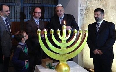 Hanukkah lighting ceremony at the infamous Steri Prison in Palermo, Sicily, the former seat of the local Inquisition.  (photo credit: courtesy/ Shavei Israel)