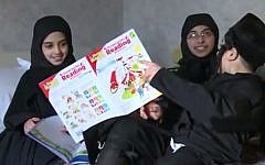 Lev Tahor children study in a hotel room in Ontario (screen capture: YouTube)