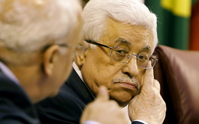 Palestinian Authority President Mahmoud Abbas during a meeting with Arab foreign ministers in Cairo, Egypt, Saturday, December 21, 2013. (photo credit: AP/Amr Nabil) Palestinian Authority President Mahmoud Abbas during a meeting with Arab foreign ministers in Cairo, Egypt, Saturday, December 21, 2013. (photo credit: AP/Amr Nabil)