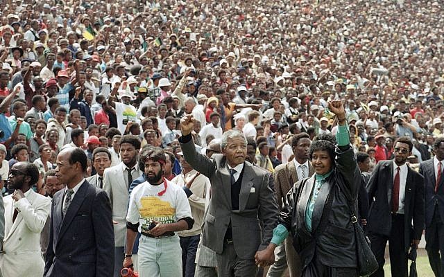 Nelson Mandela and Winnie Mandela give black power salutes as they enter Soccer City stadium in the Soweto township of Johannesburg, South Africa, shortly after his release from 27 years in prison in 1990. (photo credit: AP/Udo Weitz, File) Nelson Mandela and Winnie Mandela give black power salutes as they enter Soccer City stadium in the Soweto township of Johannesburg, South Africa, shortly after his release from 27 years in prison in 1990. (photo credit: AP/Udo Weitz, File)