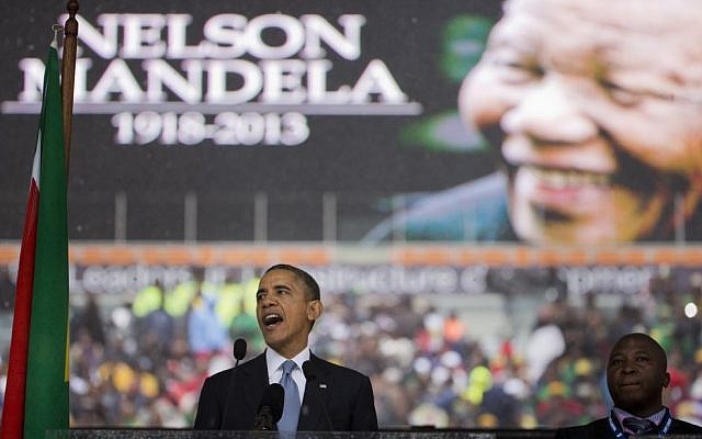 US President Barack Obama speaks to crowds attending the memorial service for former South African president Nelson Mandela at the FNB Stadium in Soweto near Johannesburg, Tuesday, December 10, 2013 (photo credit: AP/Evan Vucci) US President Barack Obama speaks to crowds attending the memorial service for former South African president Nelson Mandela at the FNB Stadium in Soweto near Johannesburg, Tuesday, December 10, 2013 (photo credit: AP/Evan Vucci)
