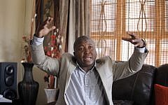 Thamsanqa Jantjie,  the man accused of faking sign interpretation next to world leaders at Nelson Mandela's memorial, during an interview with the Associated Press in Johannesburg, South Africa,Thursday, Dec. 12, 2013. (Photo credit: AP/Tsvangirayi Mukwazhi)