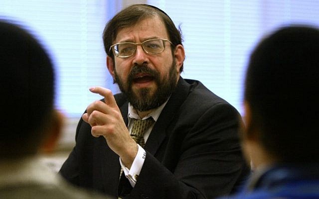 In a Jan. 7, 2003 photo, Rabbi S. Binyomin Ginsberg leads students at the Torah Academy in St. Louis Park, Minn., in a discussion and debate. (photo credit: AP Photo/The Star Tribune,Bruce Bisping) In a Jan. 7, 2003 photo, Rabbi S. Binyomin Ginsberg leads students at the Torah Academy in St. Louis Park, Minn., in a discussion and debate. (photo credit: AP Photo/The Star Tribune,Bruce Bisping)
