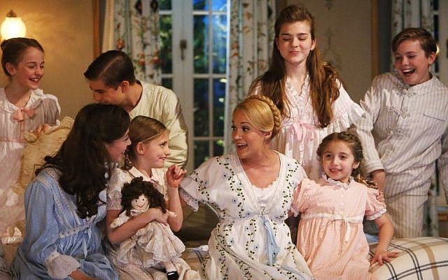 This photo provided by NBC shows, from left, Sophia Ann Caruso as Brigitta, Ariane Rinehart as Liesl, Michael Nigro as Friedrich, Grace Rundhaug as Marta, Carrie Underwood as Maria, Ella Watts-Gorman as Louisa, Peyton Ella as Gretl, and Joe West as Kurt, in 'The Sound of Music Live!'. (photo credit: AP Photo/NBC, Will Hart) This photo provided by NBC shows, from left, Sophia Ann Caruso as Brigitta, Ariane Rinehart as Liesl, Michael Nigro as Friedrich, Grace Rundhaug as Marta, Carrie Underwood as Maria, Ella Watts-Gorman as Louisa, Peyton Ella as Gretl, and Joe West as Kurt, in 'The Sound of Music Live!'. (photo credit: AP Photo/NBC, Will Hart)