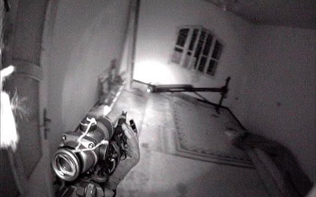 The view from the barrel of an IDF Special Forces soldier's weapon during a raid deep in Lebanon during the Second Lebanon War (Photo credit: IDF/ Flash 90) The view from the barrel of an IDF Special Forces soldier's weapon during a raid deep in Lebanon during the Second Lebanon War (Photo credit: IDF/ Flash 90)
