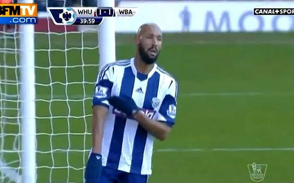 Nicolas Anelka makes the 'quenelle' gesture on December 28 (screenshot: YouTube)