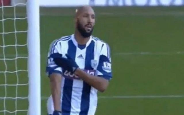 Nicolas Anelka makes the quenelle gesture after his goal for West Bromwich Albion against West Ham United, December 28, 2013 (photo credit: YouTube screenshot) Nicolas Anelka makes the quenelle gesture after his goal for West Bromwich Albion against West Ham United, December 28, 2013 (photo credit: YouTube screenshot)