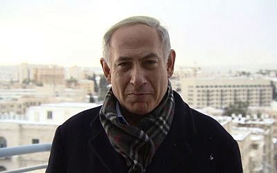 Prime Minister Benjamin Netanyahu sends a Christmas message via video, December 2013. (screen capture: Youtube/IsraeliPM)