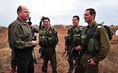 Defense Minister Moshe Ya'alon during a recent visit to the Golan Heights (Photo credit: Ariel Hermoni/ Ministry of Defense)
