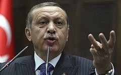 Turkish Prime Minister Recep Tayyip Erdogan addresses lawmakers at the parliament in Ankara, Turkey. (photo credit: AP Photo/File)