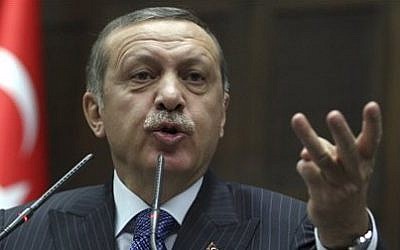 Turkish Prime Minister Recep Tayyip Erdogan addresses lawmakers at the parliament in Ankara, Turkey. (photo credit: AP Photo/File)