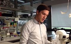 Sam 'Ushy' Katz rocks out to a hassidic niggun in the lab. (photo credit: screenshot)